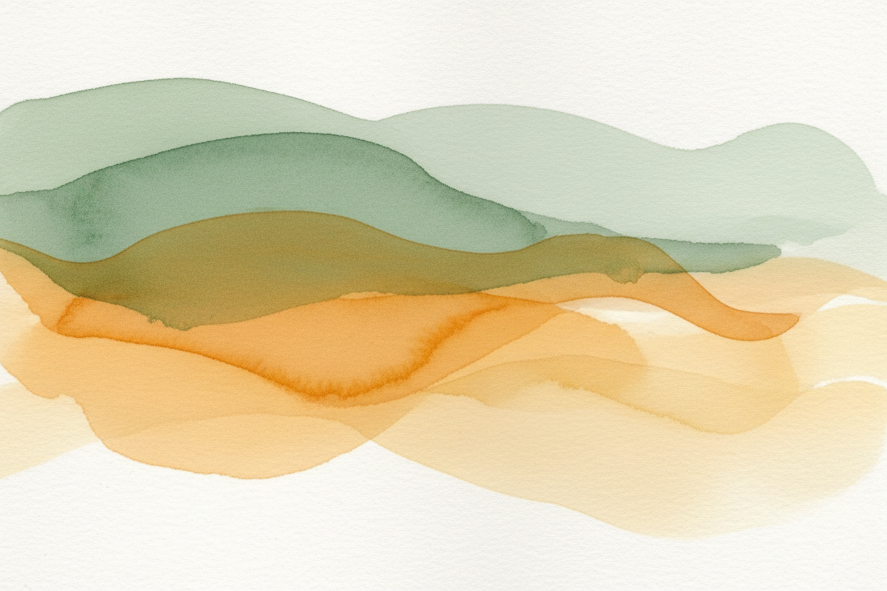 Abstract watercolor with soft blooms of golden amber and warm tones
